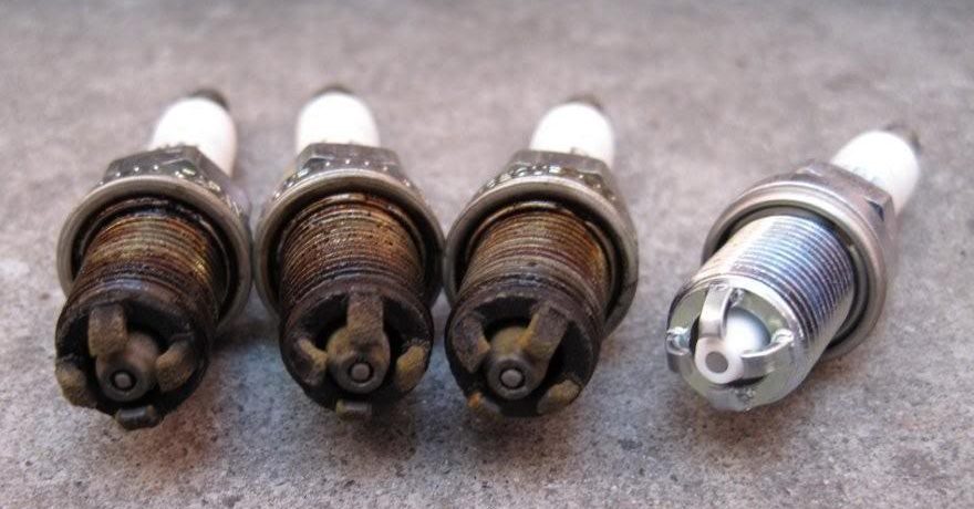 Bujía con olor a gasolina en motor
