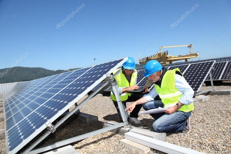 depositphotos 18217865 stock photo engineers checking solar panels running