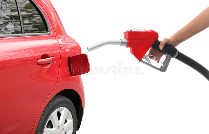 Coche en una gasolinera con surtidor